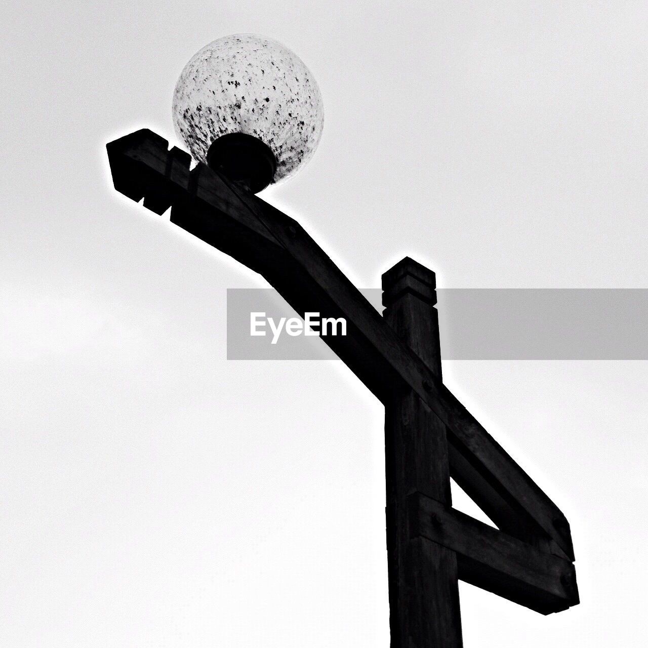 Low angle view of lamp against clear sky