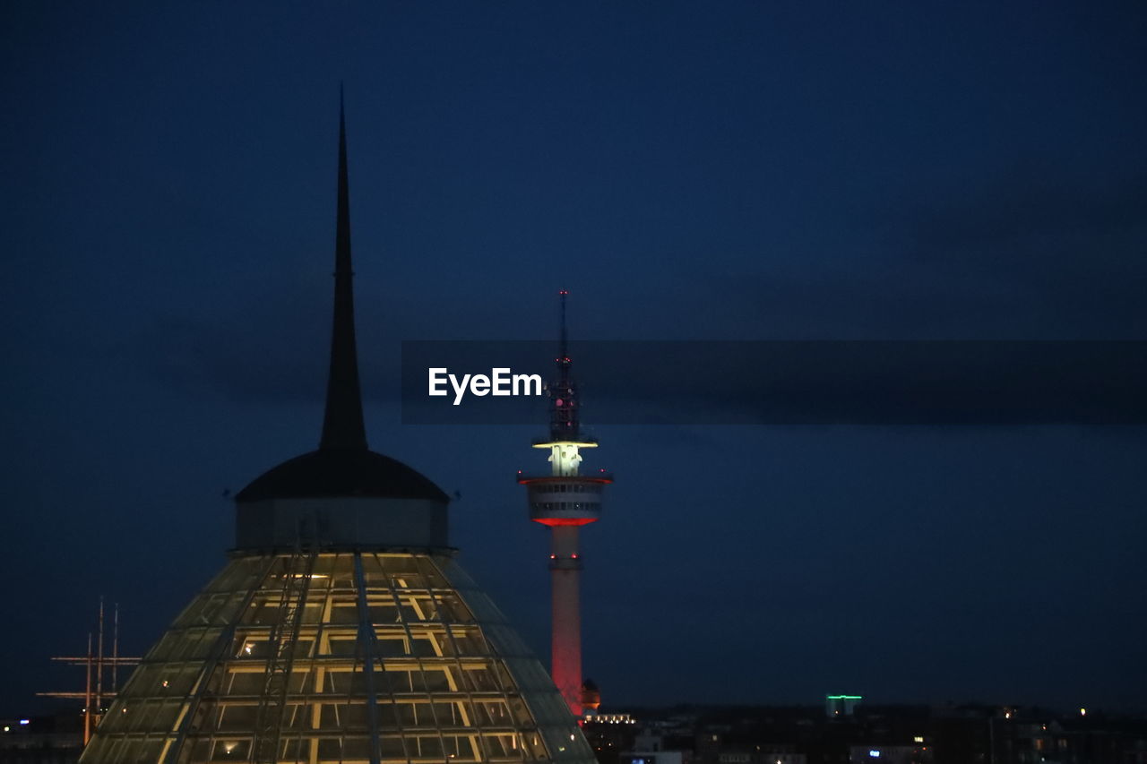 View of communications tower at night