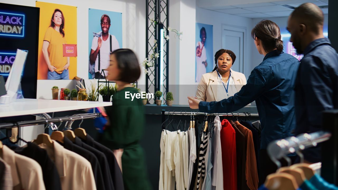 rear view of business people working in store