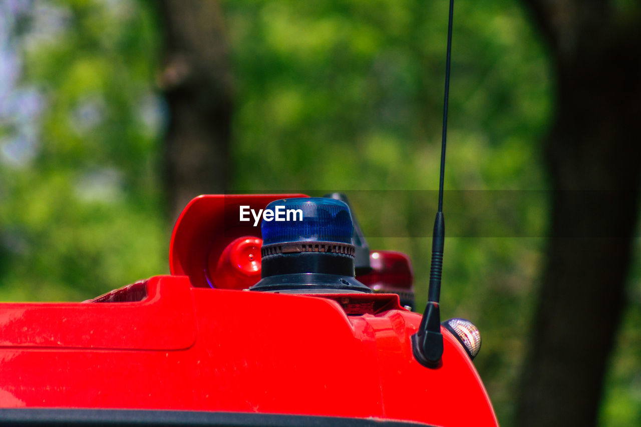 CLOSE-UP OF RED TOY CAR