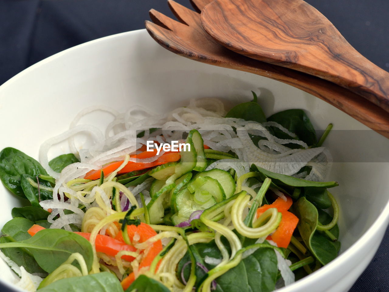 CLOSE-UP OF CHOPPED VEGETABLES IN BOWL