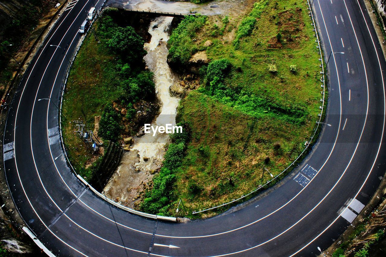 High angle shot of curved road along landscape