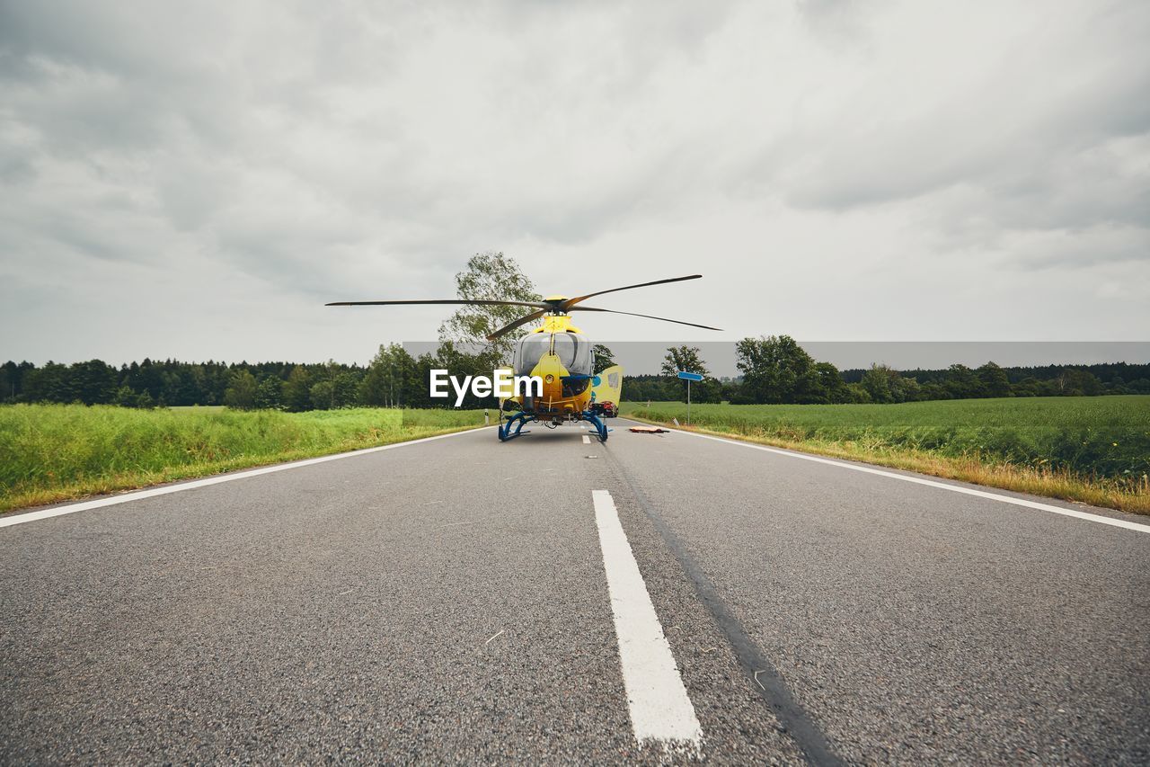 low angle view of airplane on road