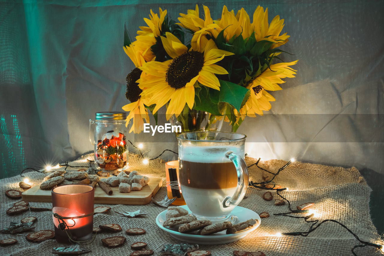 Close-up of sunflowers on table at home