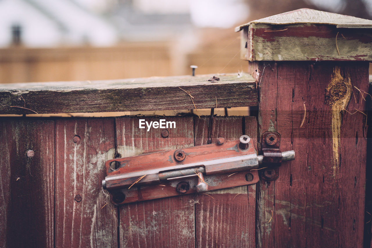 Close-up of latch on a wooden door