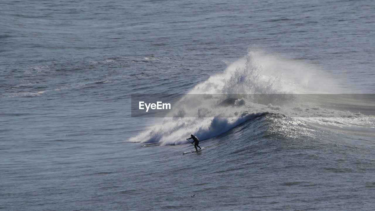 Man surfing in sea