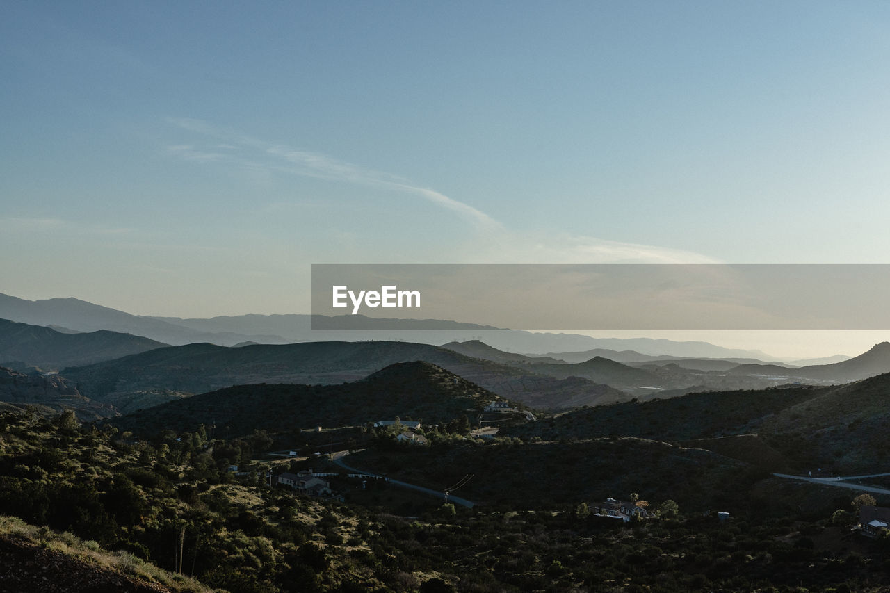 SCENIC VIEW OF MOUNTAIN RANGE AGAINST SKY