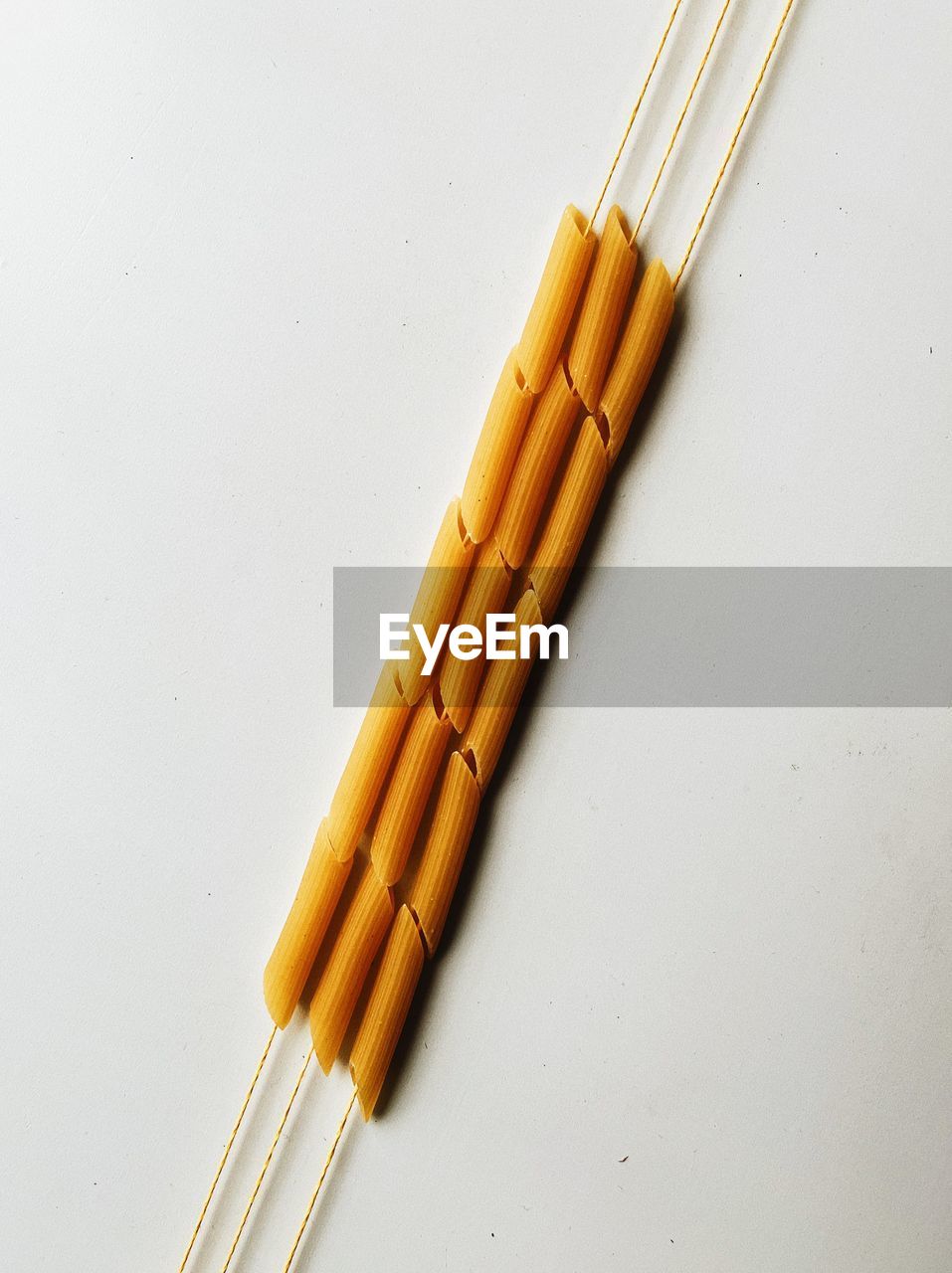 High angle view of pasta on white background