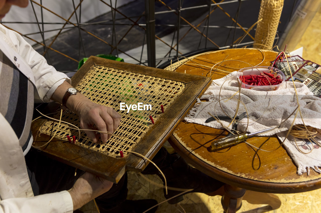 High angle view of man working in shopping mall