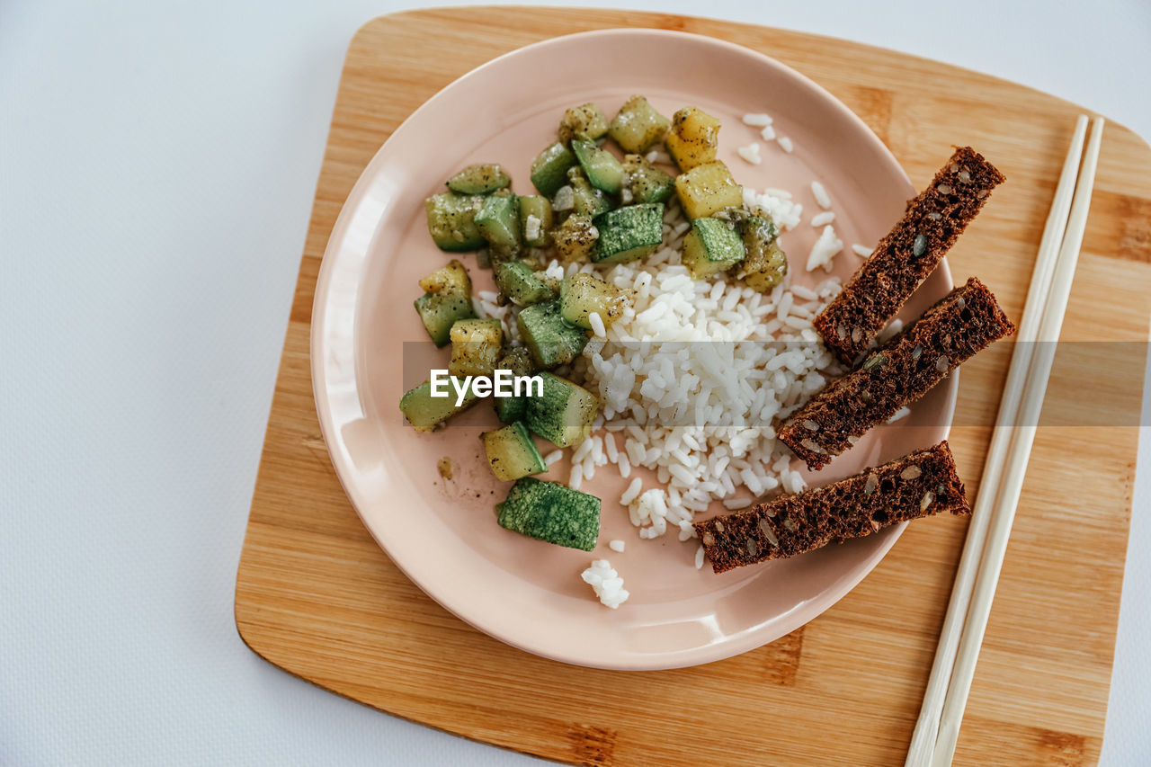 Zucchini and rice, grain bread- proper food