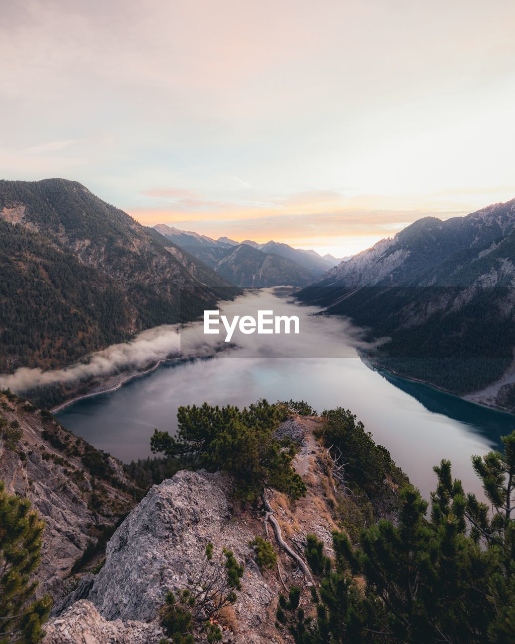 High angle view of mountains against sky during sunset