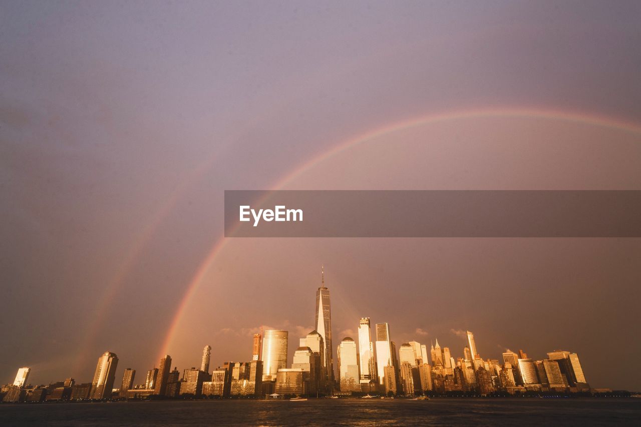 View of rainbow over city