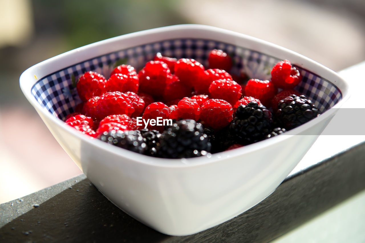 Close-up of berry fruit in bowl on table