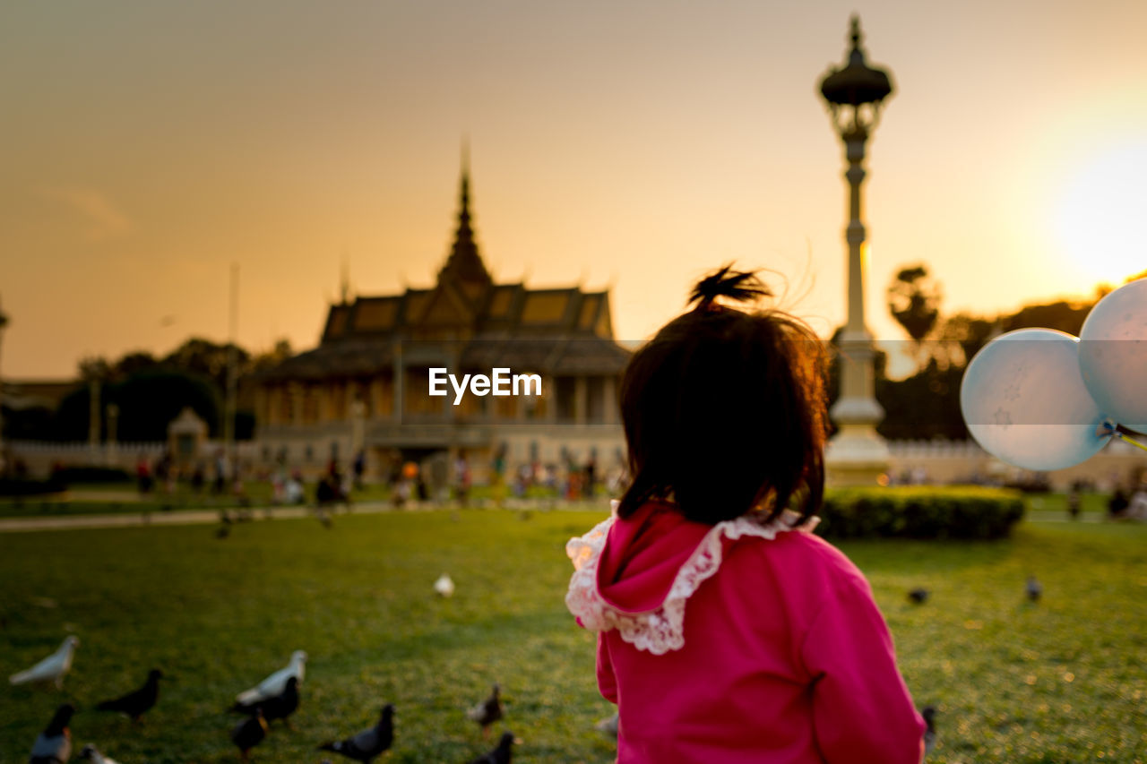 View of girl watching royal stupa