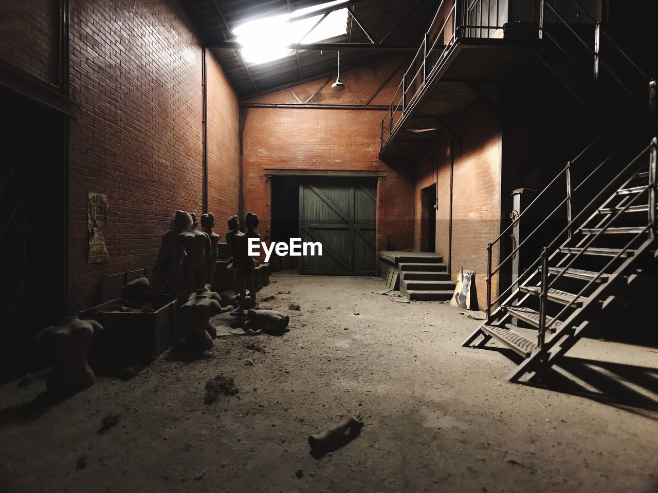 EMPTY CHAIRS IN ILLUMINATED ROOM