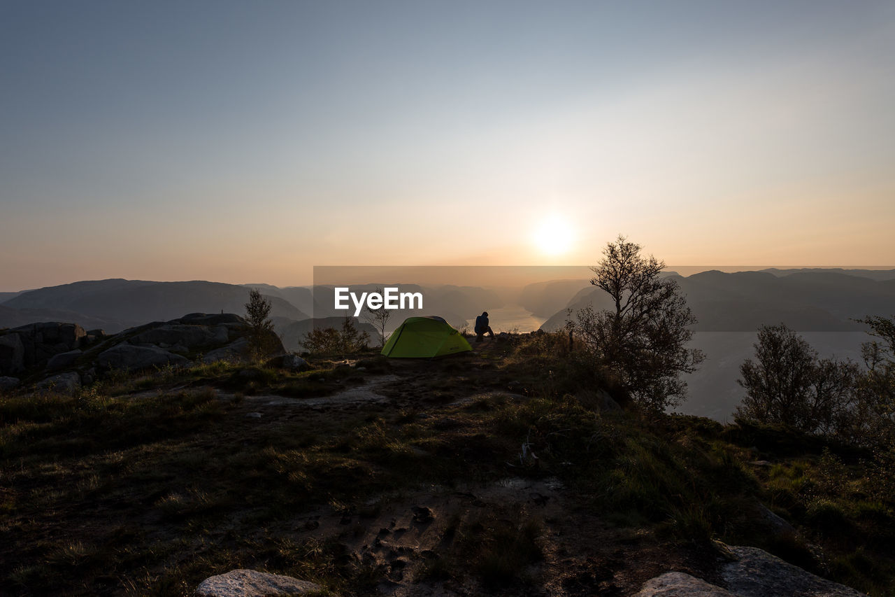 Scenic view of landscape against sky during sunset