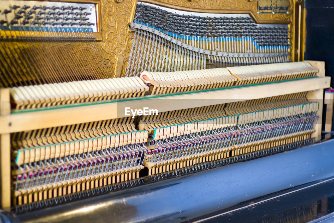 Piano instrument inside, antiquary piano and old mechanism, close-up