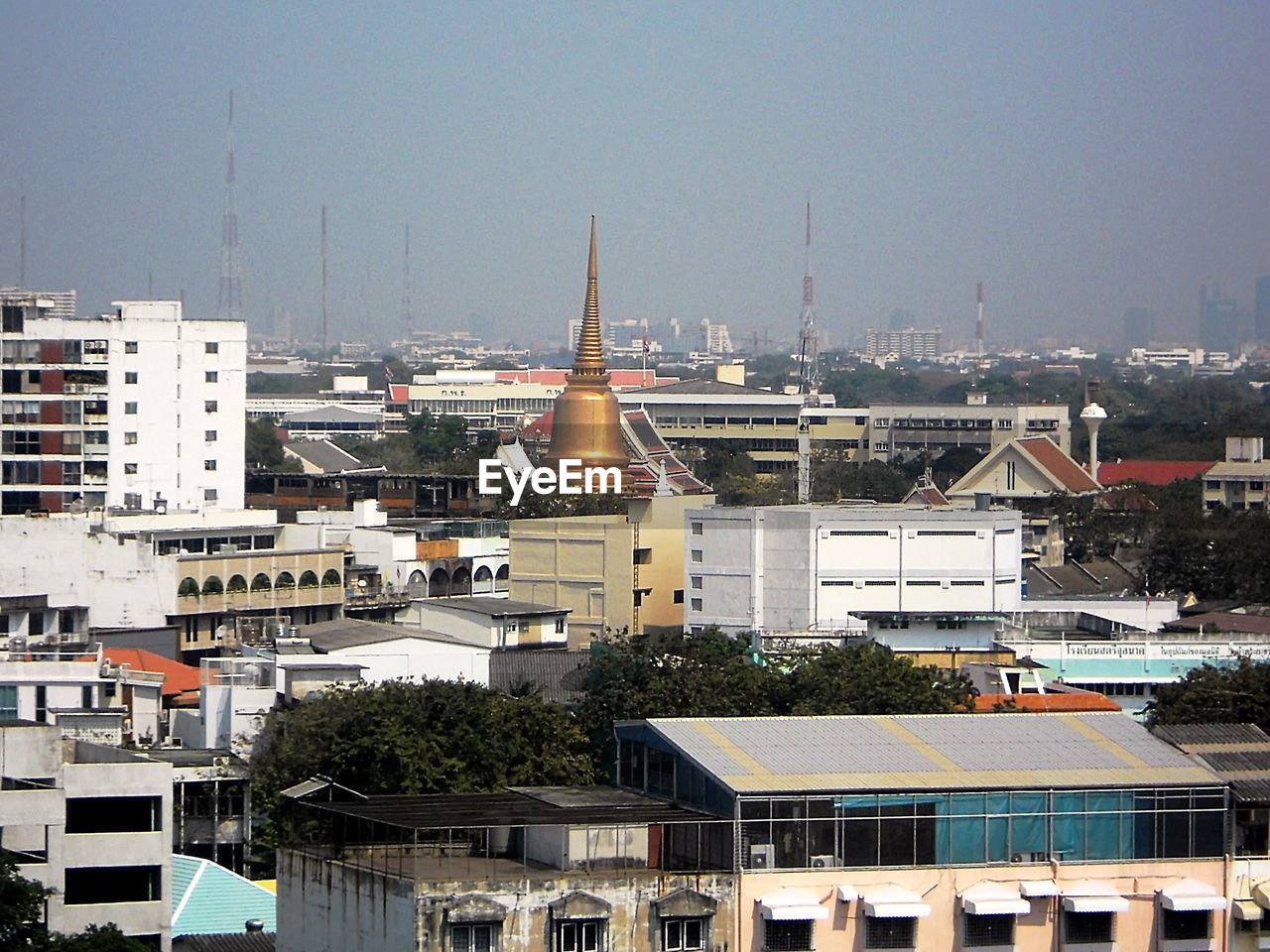 HIGH ANGLE VIEW OF BUILDINGS AGAINST CLEAR SKY