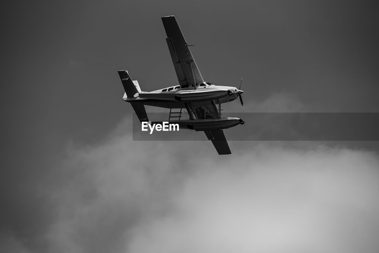 Low angle view of seaplane against sky