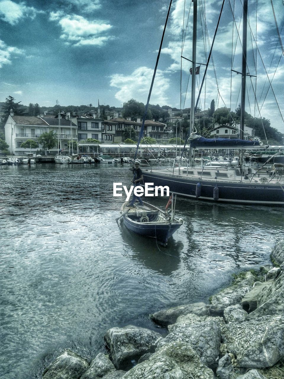 SAILBOATS IN HARBOR