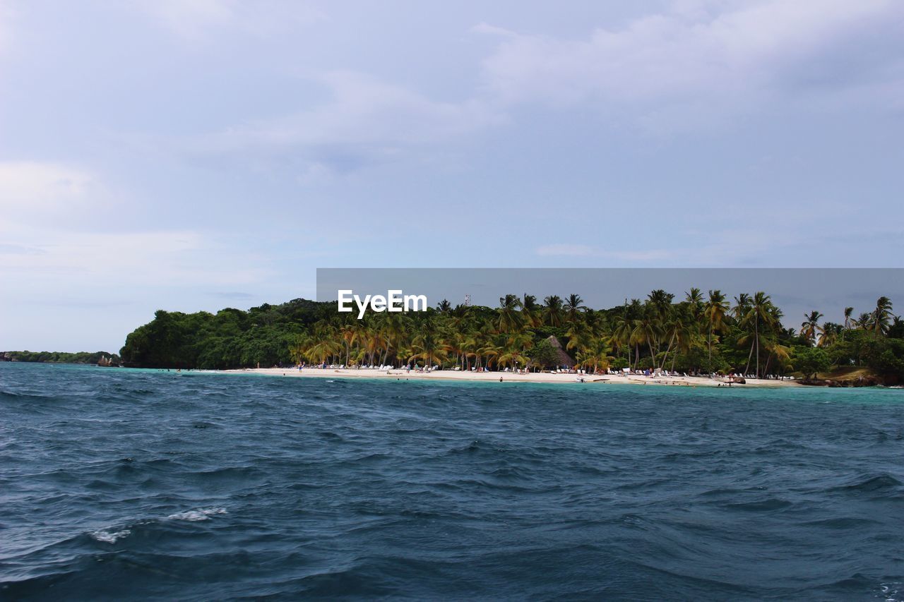 View of calm sea against cloudy sky