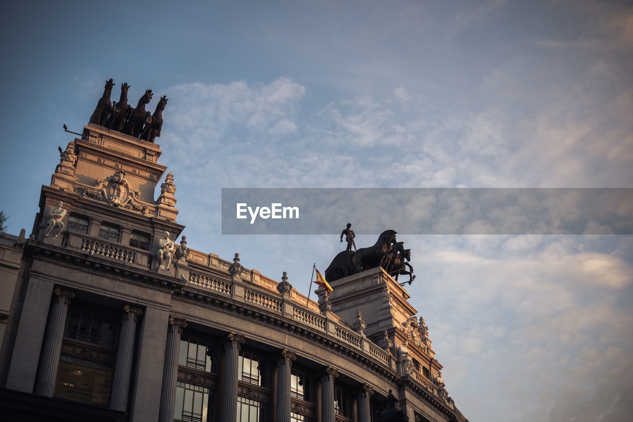 Low angle view of building against sky, madrid