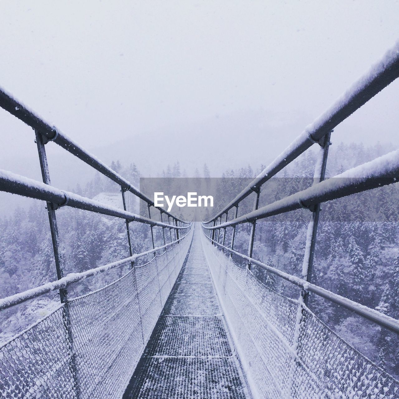 BRIDGE IN FOGGY WEATHER