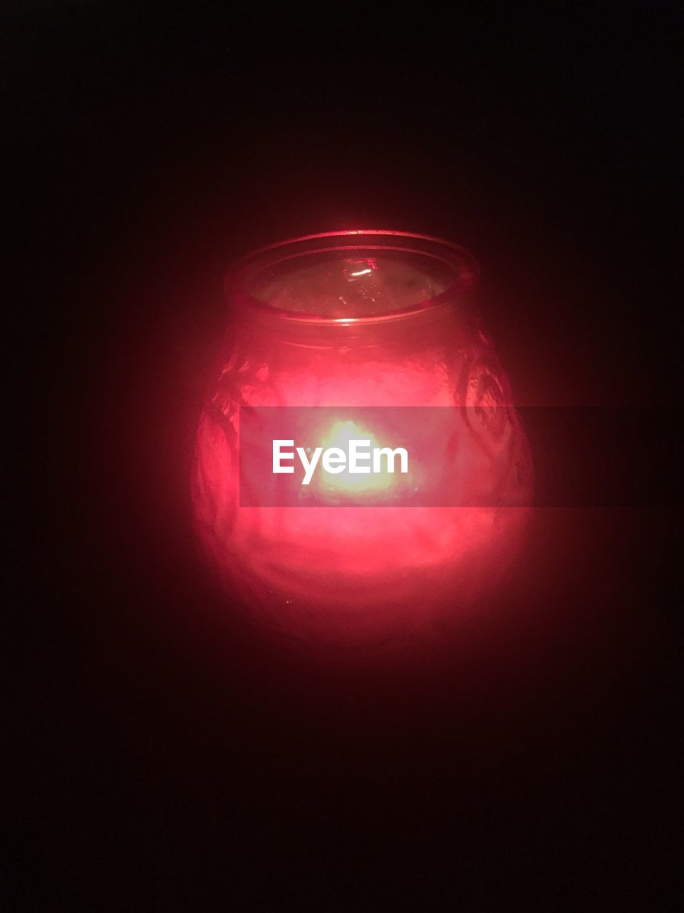 LOW ANGLE VIEW OF LIT LAMP