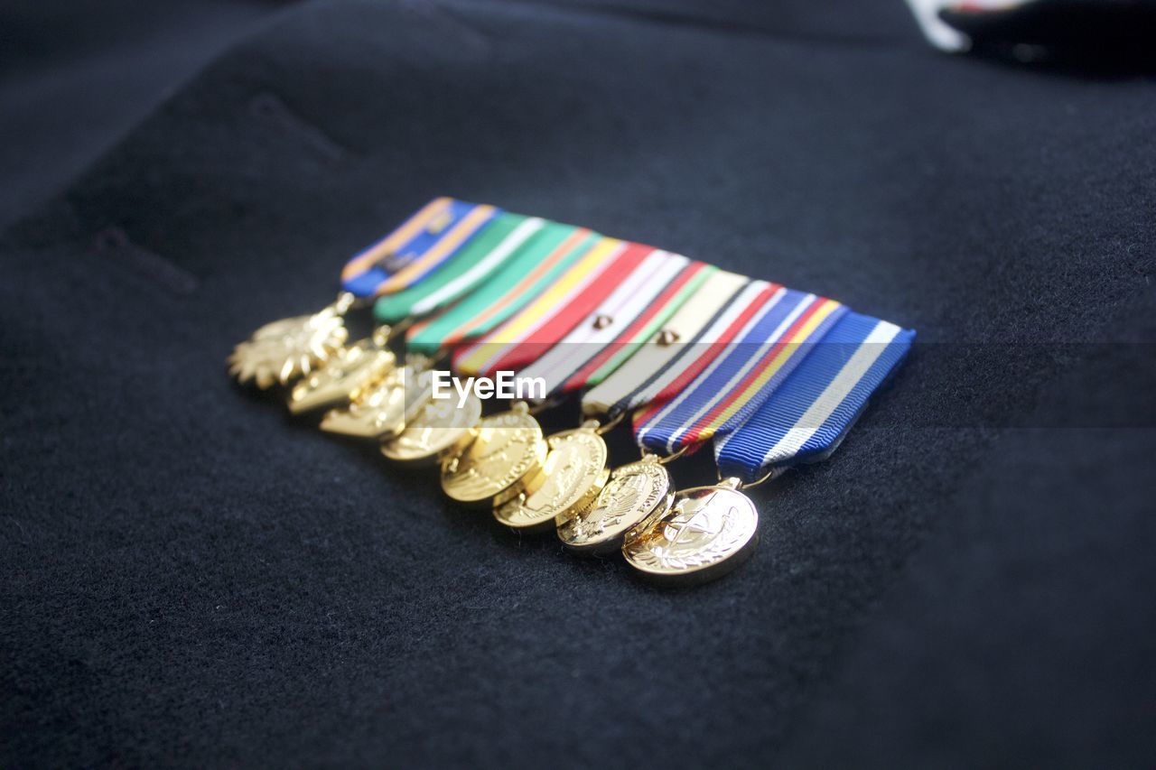 Close-up of medals on uniform