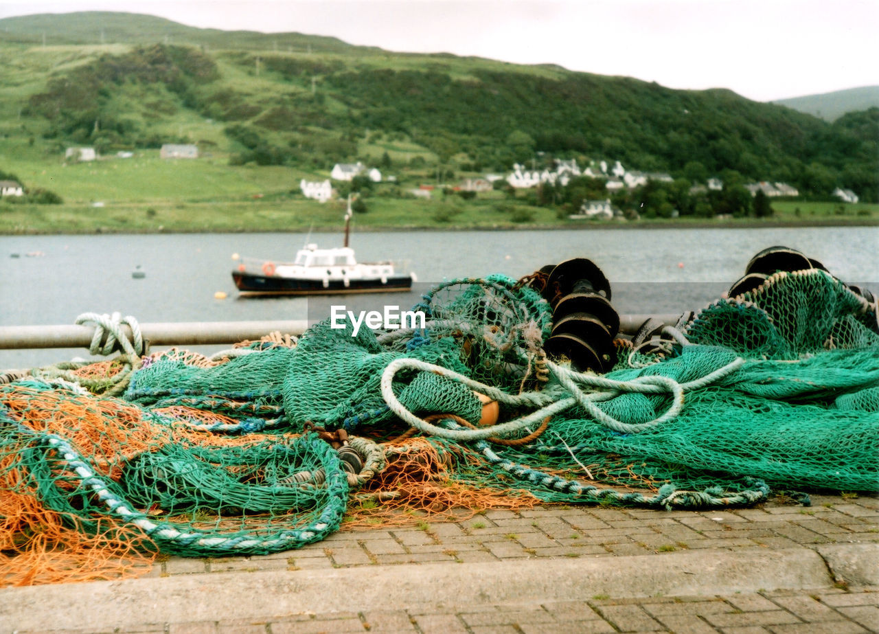Close-up of fishing nets at harbor