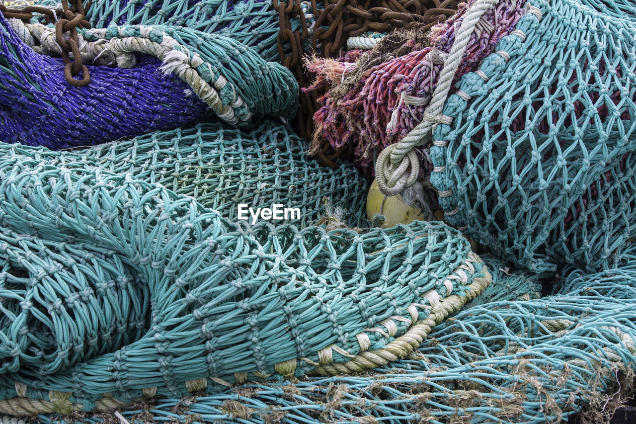 High angle view of fishing net at harbor