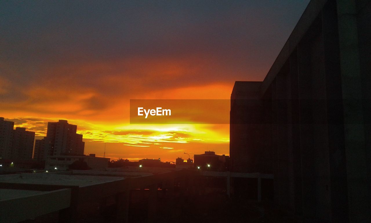 SILHOUETTE OF CITY AT SUNSET