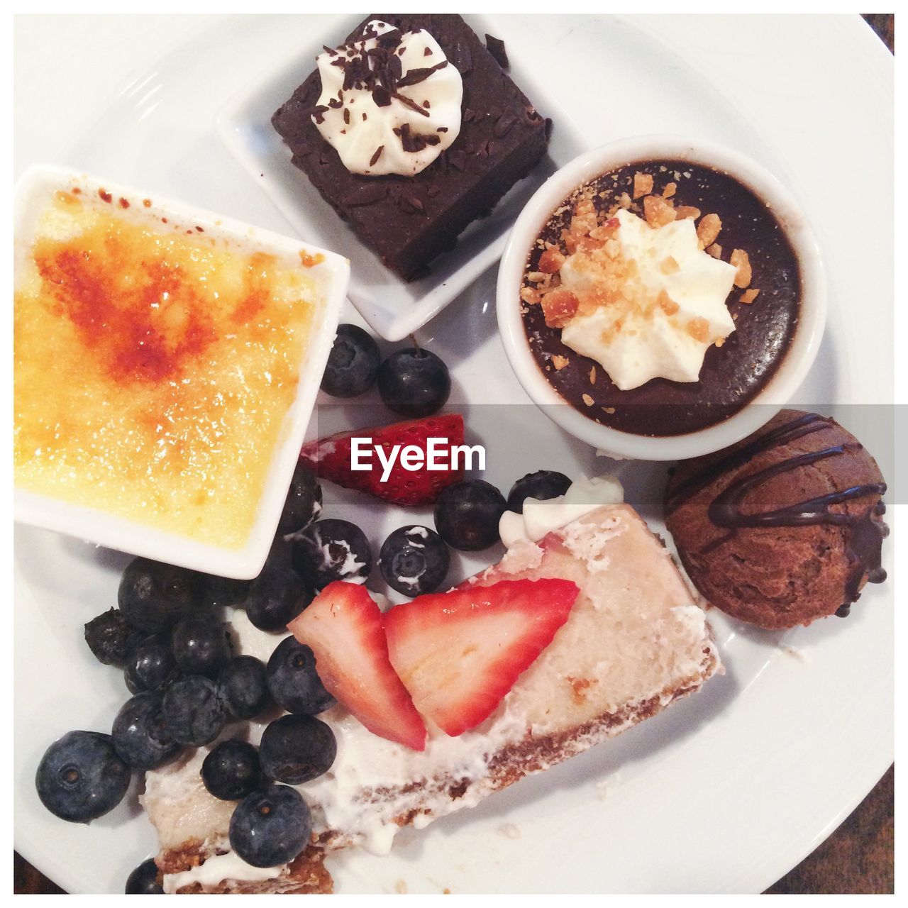 High angle view of variety of desserts served on plate