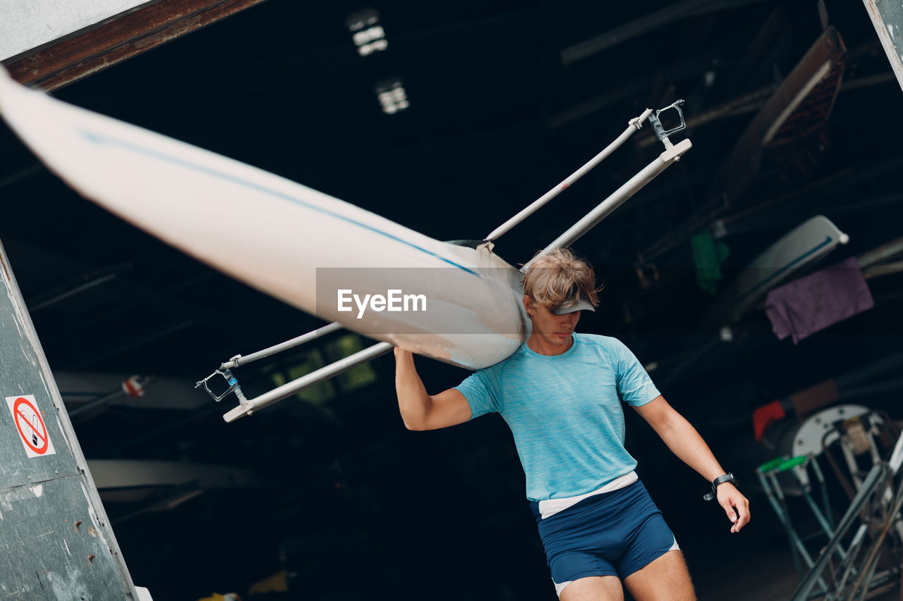 Man standing in boat