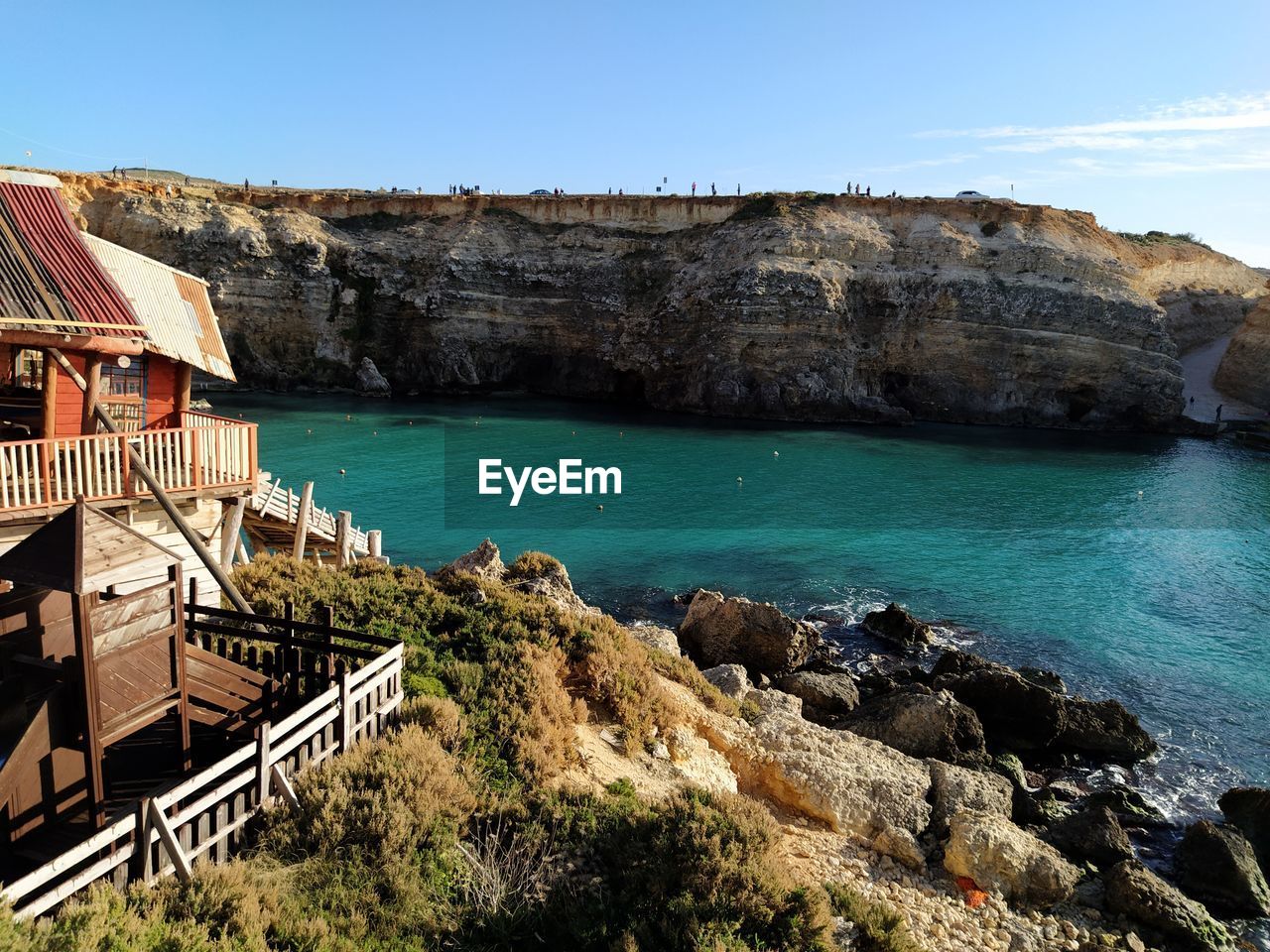 Panoramic view of sea and rocks against sky