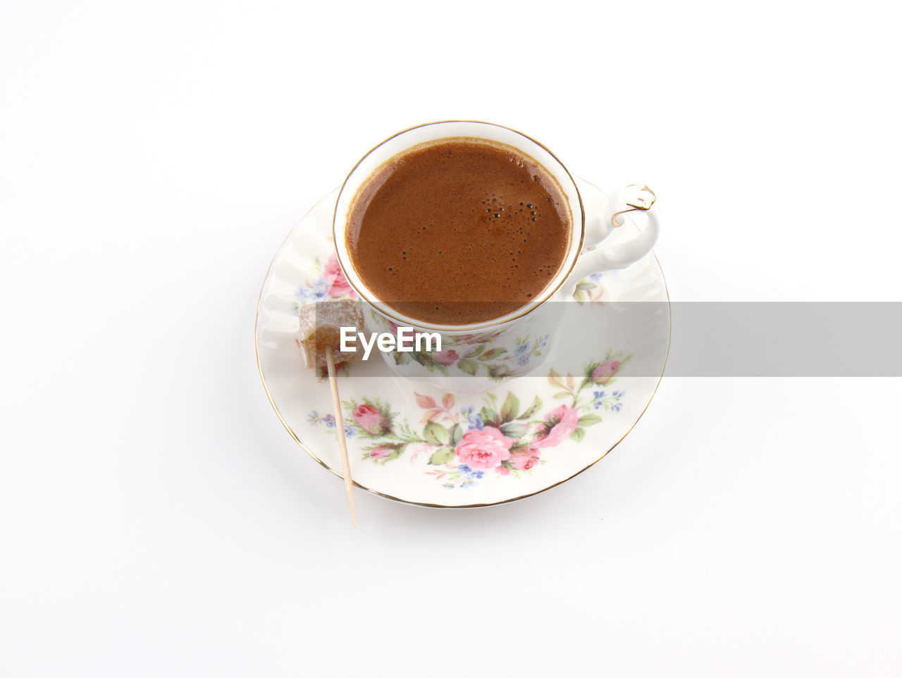 HIGH ANGLE VIEW OF COFFEE CUP AND WHITE