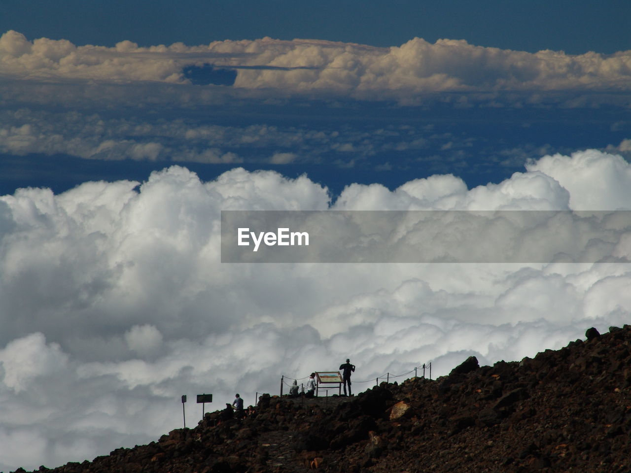 View of landscape against cloudy sky