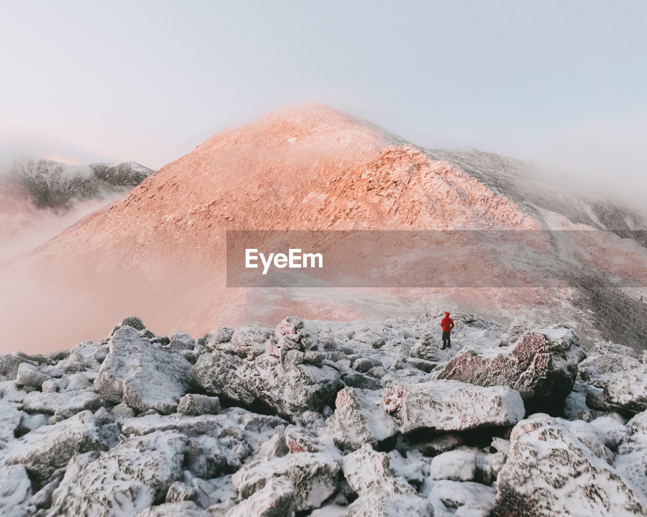 Scenic view of snow covered mountain against sky during winter