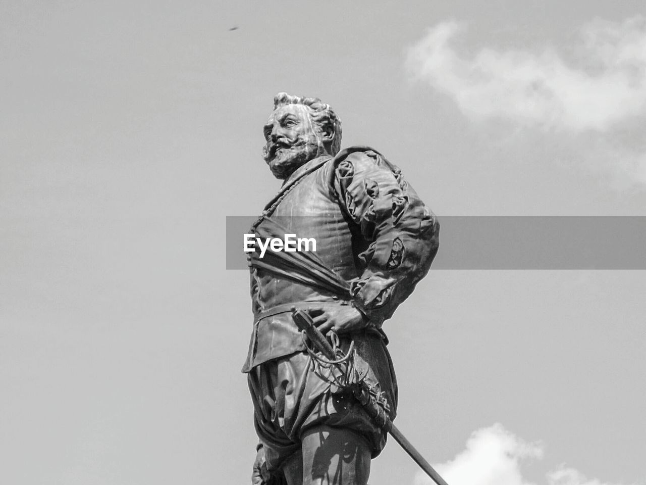 Low angle view of sir francis drake sculpture against sky