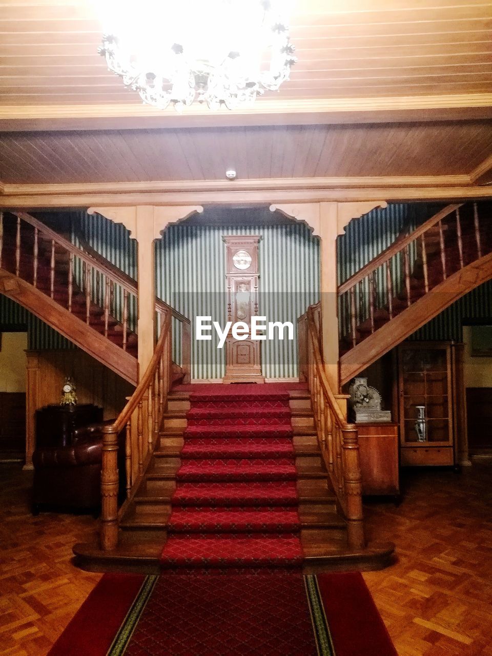 STAIRCASE IN ILLUMINATED ROOM