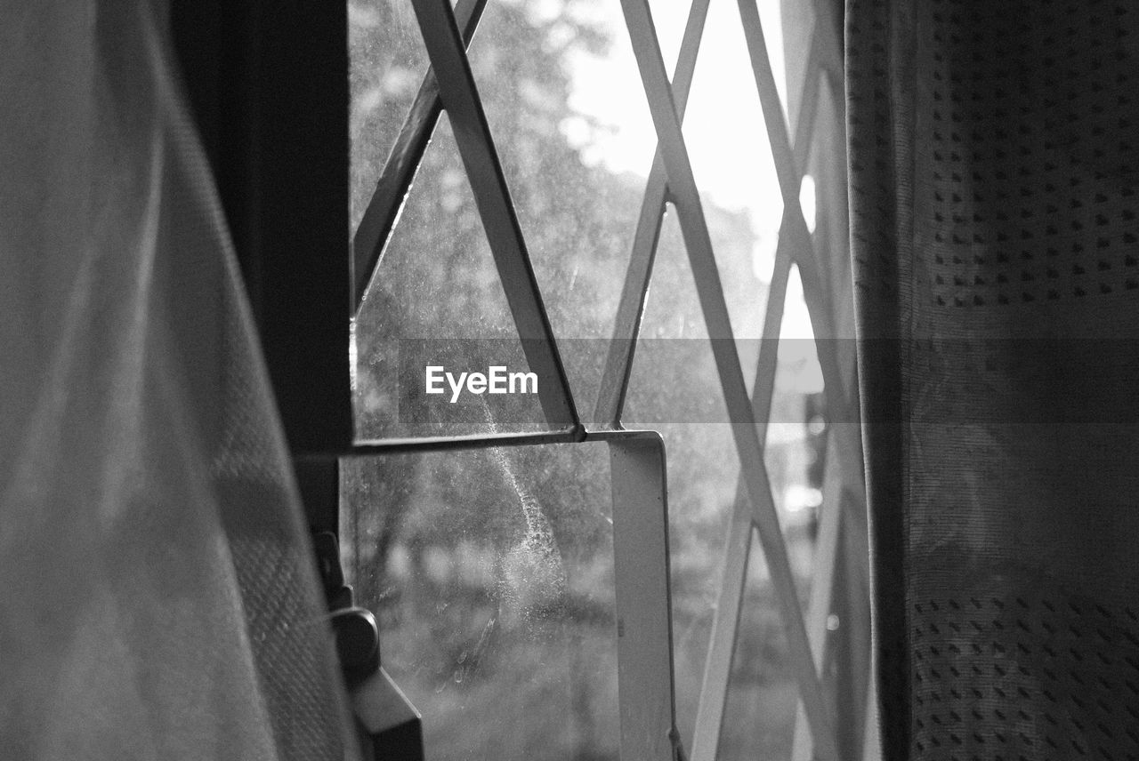 CLOSE-UP OF CURTAIN AGAINST SKY