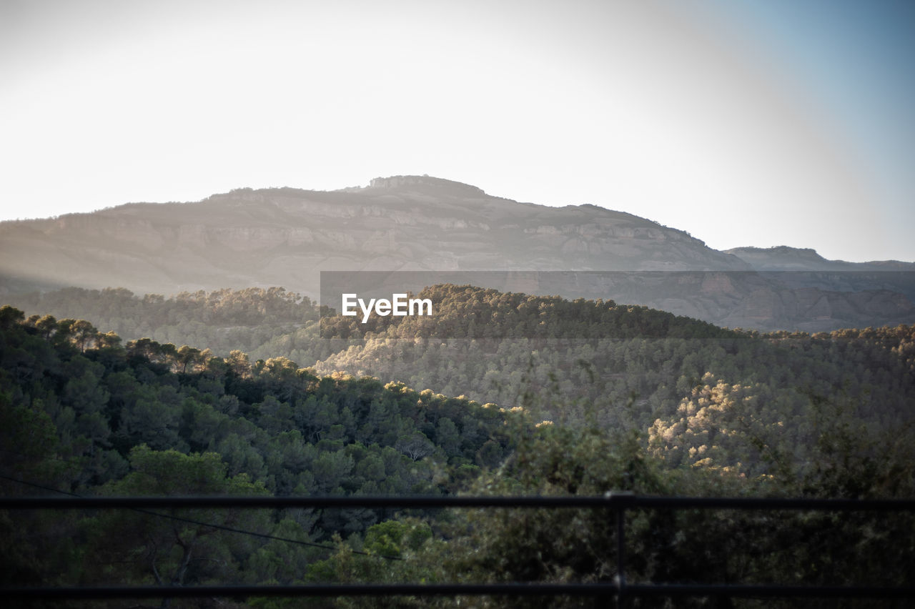 Scenic view of mountains against clear sky