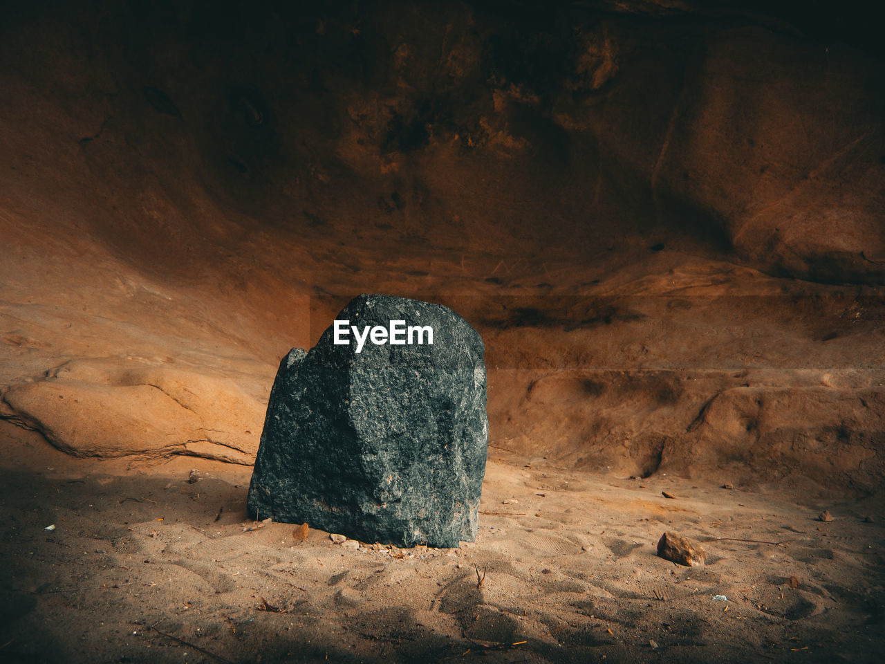 High angle view of rock formation on sand