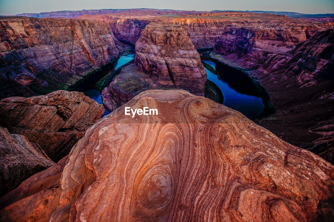 Scenic view of canyon against sky