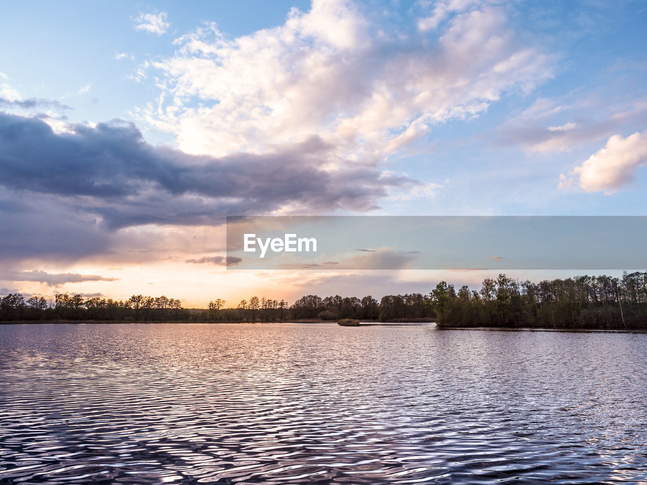 LAKE AGAINST SKY DURING SUNSET