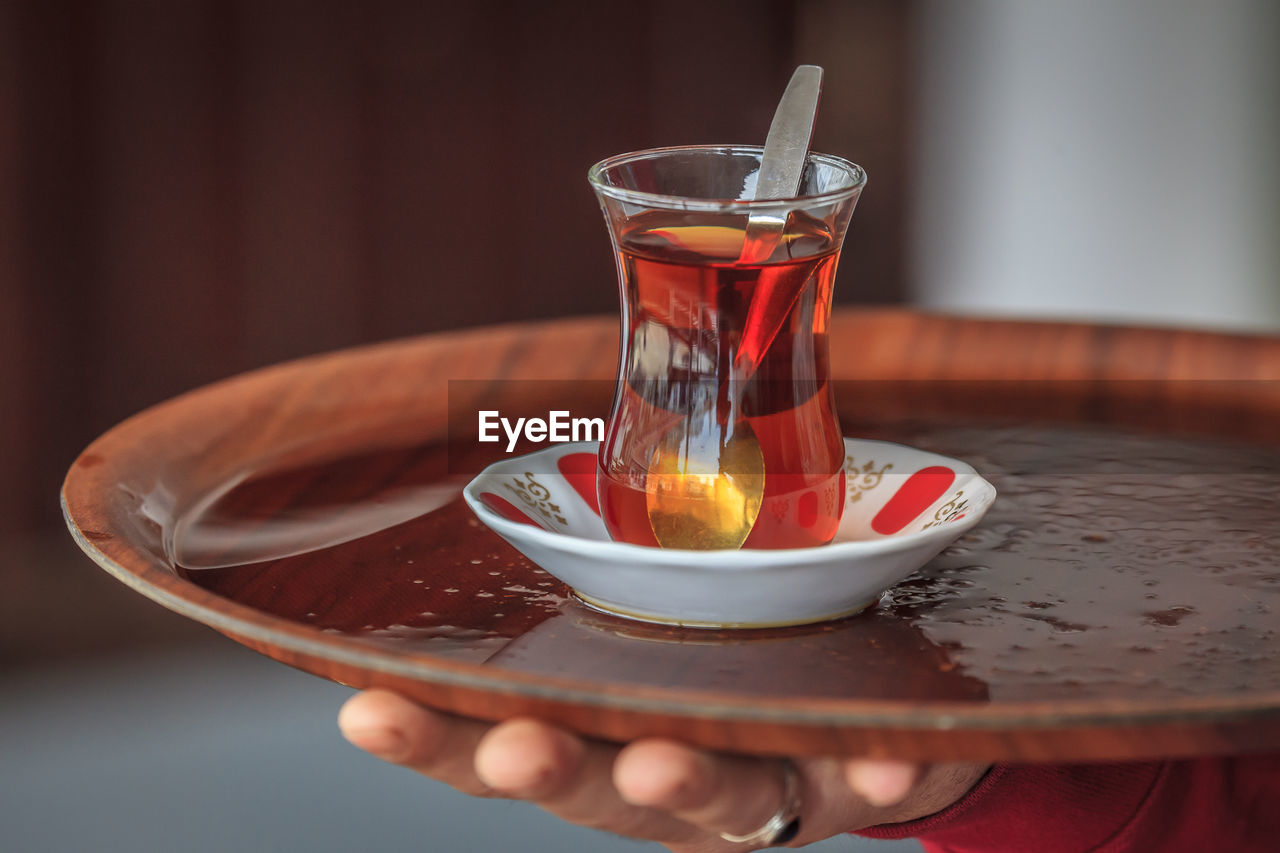 Close-up of drink in glass on plate