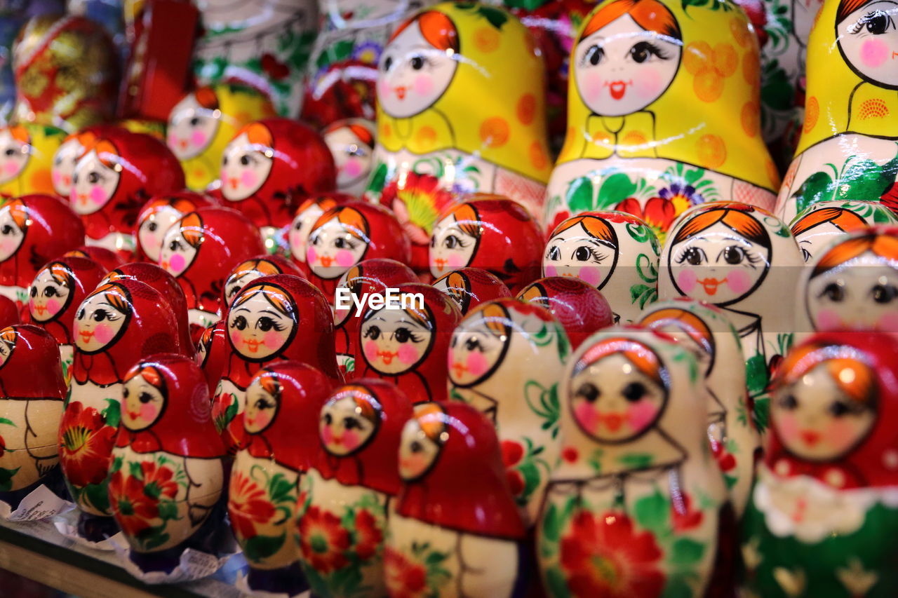 Group of colorful russian matryoshka dolls in tourist shop moscow, russia. nesting dolls. babushka.
