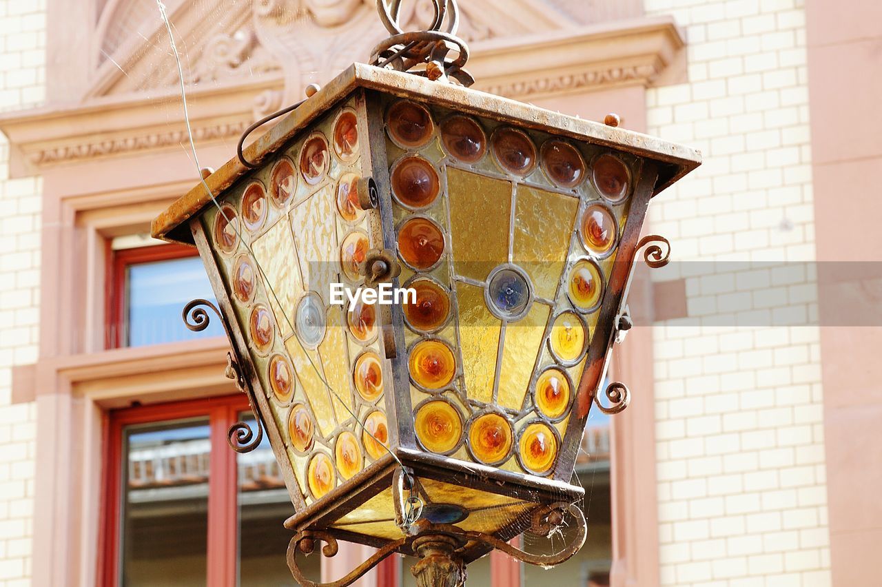 Low angle view of glass lantern