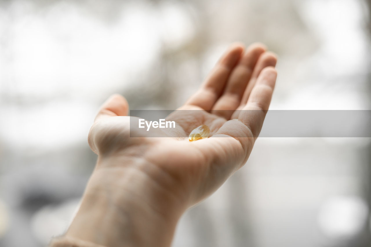 cropped hand of person holding hands