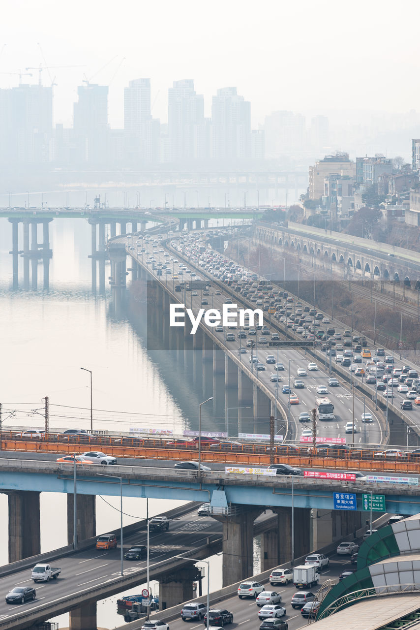 high angle view of bridge over river in city